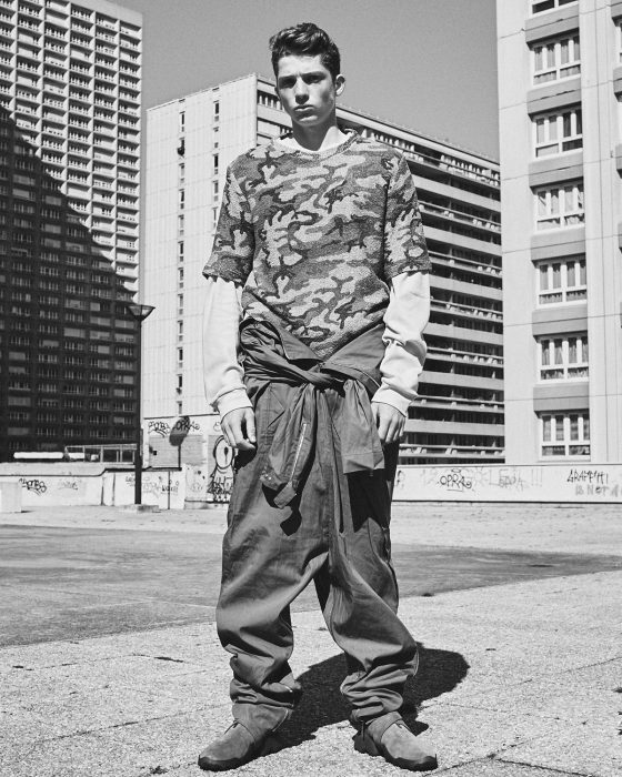 Quentin wears jumpsuit Lacoste, t-shirt Vivienne Westwood, long sleeves t-shirt Hed Mayner.