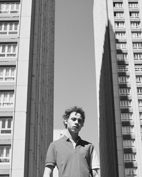 Lye wears polo shirt Lacoste.