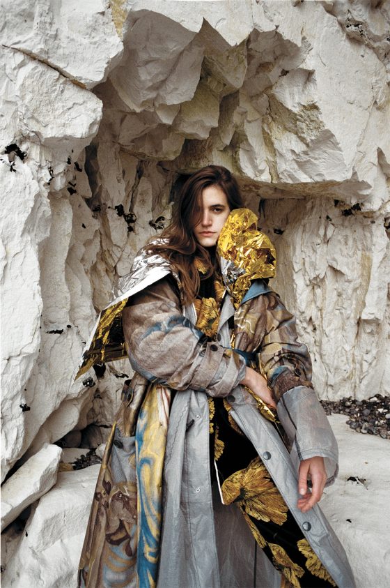 Printed parka by Dries Van Noten, coat by Prada, printed suit by Gucci.
