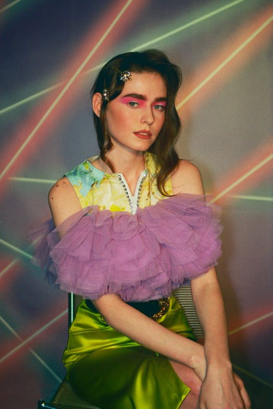 Anna Makhatazde. Double top by Brognano, skirt & belt by Versace