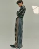 Shirt & trousers by LOEWE, shoes by J.M.WESTON