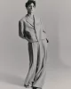 Jacket & trousers by LACOSTE, tank top by HERMÈS, necklace by CHAUMET, shoes by J.M.WESTON