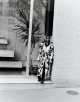 Coat & trousers by BALMAIN, shoes by BOTTEGA VANETA