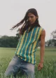 Nima wears top MARNI, trousers by MM6 MAISON MARGIELA