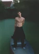 Elias wears shorts & shoes by MAISON MARGIELA, trousers by BURBERRY, necklace by CELINE HOMME