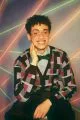 Karim Bekai / Boom. Full look by Giorgio Armani, papillon by Paul Smith, glasses by Givenchy