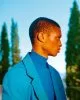 Jacket by Études, Turtleneck by Prada