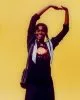 Coumba wears top & bag by Chloé, long sleeve top & jewellery from stylist’s archive
