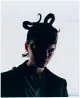 All clothes by Louis Vuitton