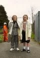 Left: Suit Michael Kors, Shirt Tiscar Espadas, Trench TOGA ARCHIVE, Trainers Jimmy Choo. Right: Tee-shirt and socks models own, Tee Dior Homme, Shorts John Lawrence Sullivan, Sandals Camper Belt Jimmy Choo