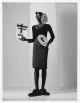 Dress by Vivienne Westwood, top by Agnes B, shoes by Collection Homme, Dior, earrings by Saint Laurent by Anthony Vaccarello