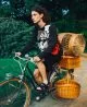 Sweater, short & shoes by Hermès, bag by Hereu