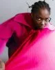 Sweater by Patou, cape by Maison Valentino