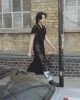 Dress by Andreas Kronthaler for Vivienne Westwood, jeans by Celine Homme, boots by Underground, earring by Slim Barrett