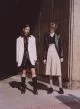 Gulliver: Blazer by Marni, shirt by Charles Jeffrey Loverboy, shorts by 1017 ALYX 9SM, boots archive. Felix: Blazer, jumper, shirt & skirt by Miu Miu, socks by Falke, shoes by Underground