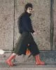 Jacket & shoes by Andreas Kronthaler for Vivienne Westwood, skirt by Loewe, sunglasses by Gentle Monster