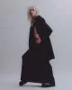 Coat & dress by Comme des Garçons Homme Plus, shoes & chain by Underground